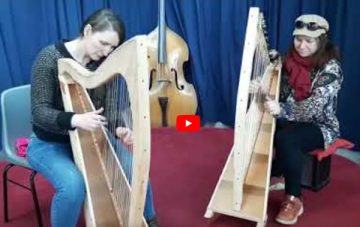 harps playing for International womens day