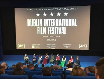 a photo of Chloe with the other filmmakers and moderator on a QnA panel after the screening