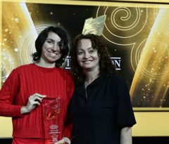 Venetia Ellis accepts the RTS Student Award for Animation on behalf of her team.