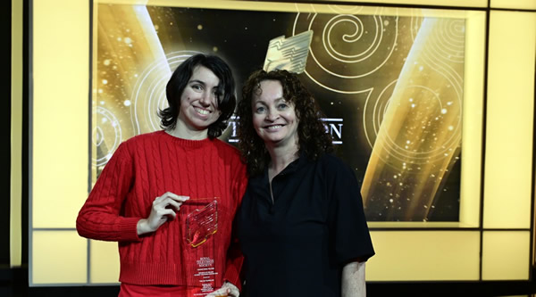 Venetia Ellis accepts the RTS Student Award for Animation on behalf of her team.