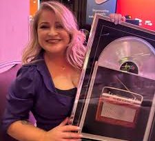 Michaela with her award